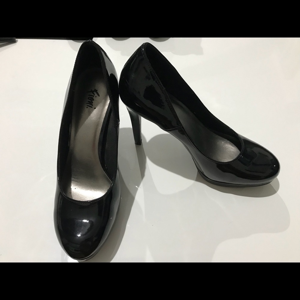 Black platform pumps